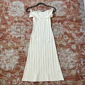 Guess Ivory dress with Flare bottom.